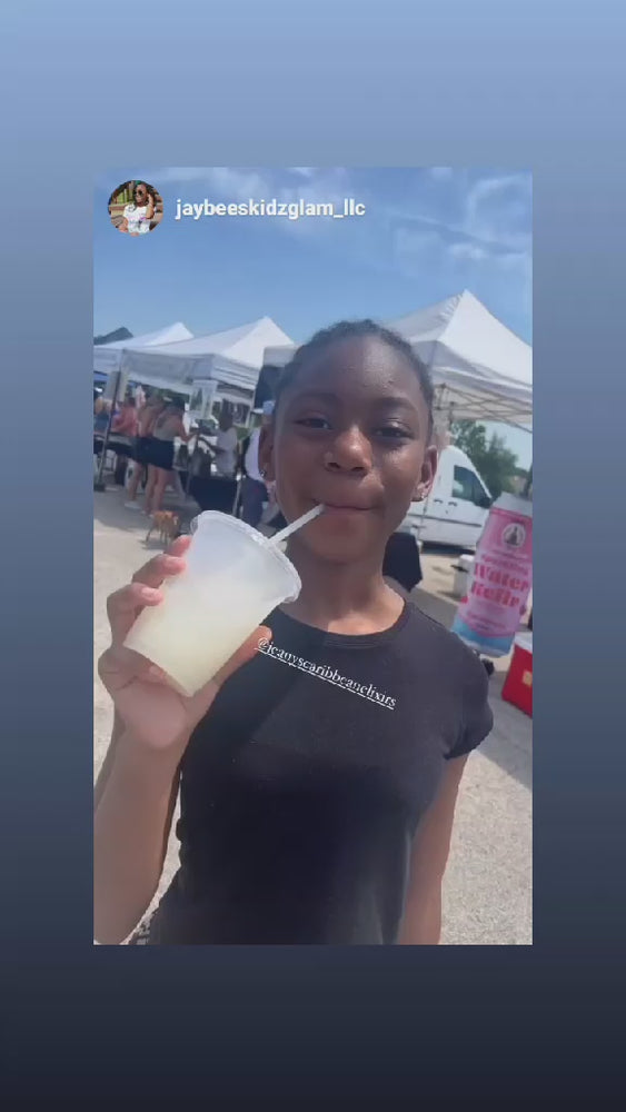 
                  
                    Load and play video in Gallery viewer, Customer drinking a 12 ounce cup of Soursop Elixir.
                  
                